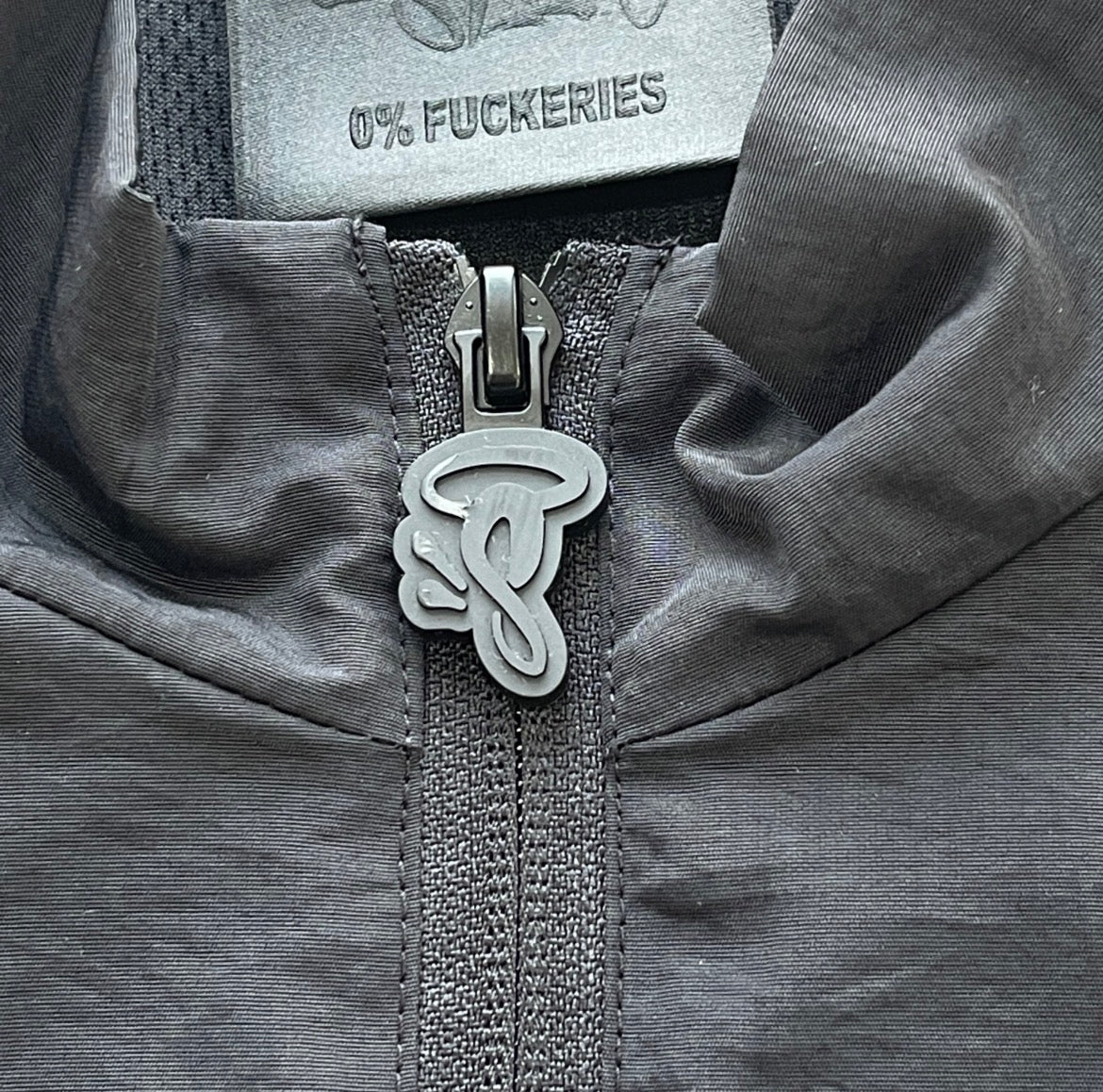 Syna Shell Tracksuit - Black/Reflective